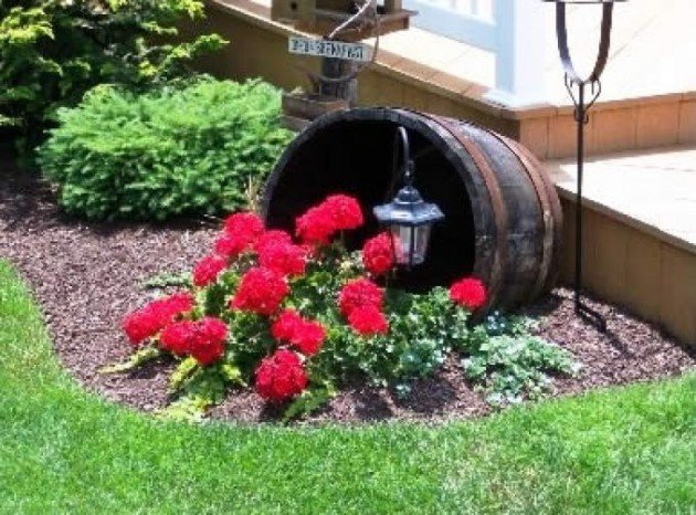 20 Fabulous Art DIY Garden Projects for This Spring - modified DIY wine barrel planter overflowing