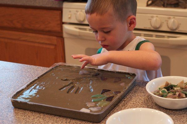 Hand & Footprint Art DIY Ideas and Projects - diy your own handprint garden stepping stone tutorial