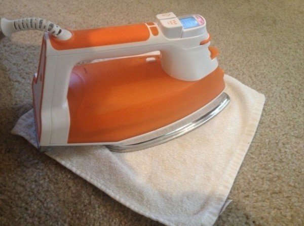 20+ Amazing Cleaning Tips that Save Time and Work4 - Iron carpet to remove hard stains