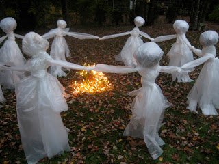 12 DIY Scary Trash Bag Halloween Decorations-Trash Bag Figures Dancing Around a Fire