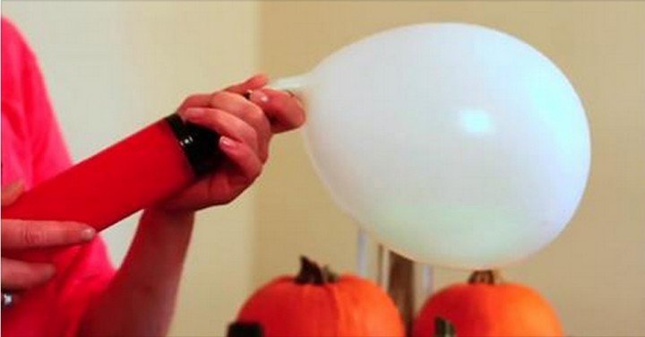 She Pops A Glow Stick Into A Balloon for One Spookiest Decoration