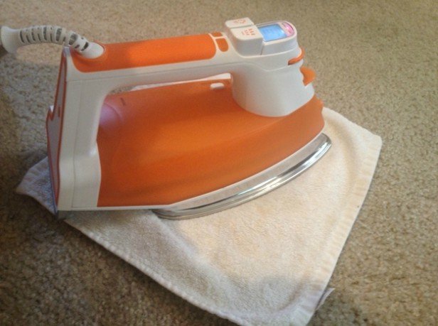 16 DIY Cleaning Hacks -remove stubborn stains from carpet with Iron