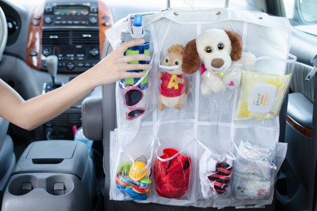 12 Brilliant Hacks To Keep Your Car Organized and Clean-Hanging backseat pockets with a shoe organizer.