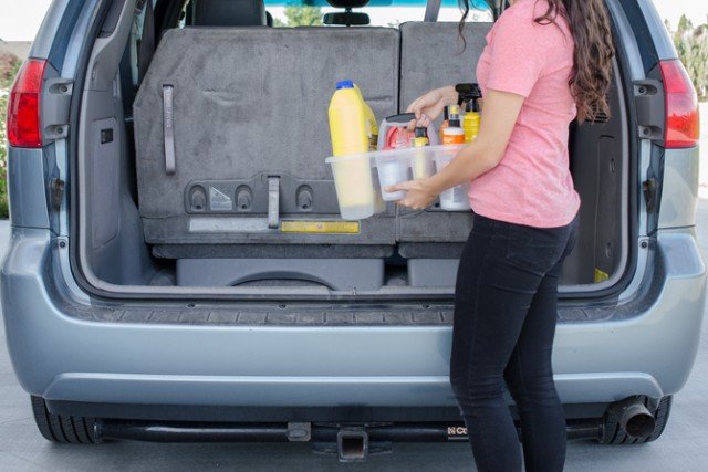 12 Brilliant Hacks To Keep Your Car Organized and Clean-Organize all the oil and fluids you need for a road trip in a shower caddy.