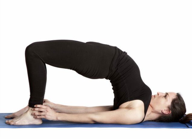 10 Easy Yoga Poses To Reduce Belly Fat -Bridge Posture