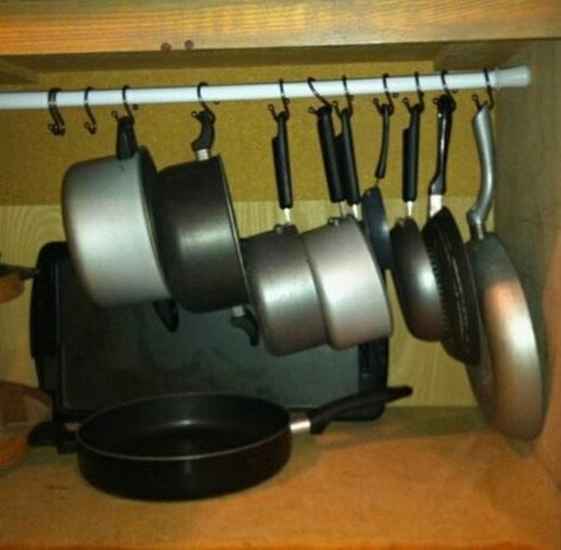 Tension Rod Uses to Keep Home Organized-Tension Rod Pot Organizer