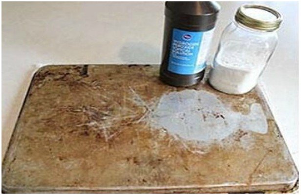 Kitchen Cleaning Hacks to Clean Burnt Baking Sheet with Hydrogen Peroxide 