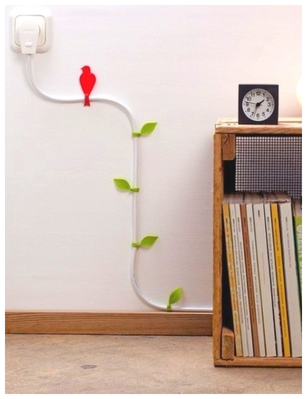 Turn your power chords into pretty vines - Genius Ways to Hide The Eyesores In Your Home